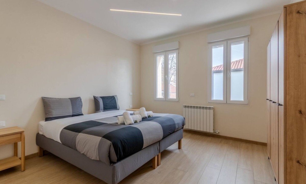 Tessera Apartment | A bright and welcoming 90 square meters apartment, perfect for seven people, located on the first floor of a building without an elevator.The property is located in Tessera, a suburb close to Marco Polo Airport. The location is also ideal for reaching Ve