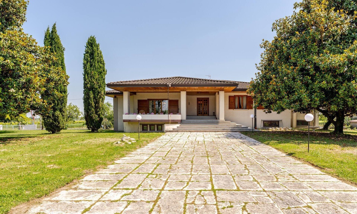 Rivarotta di Pasiano House | A cozy luxury villa surrounded by greenery, featuring spacious, breathtaking terraces