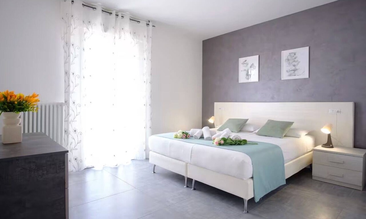 Bagnolo Apartment | Apartment 'Flower' with Shared Garden, Wi-Fi and Air Conditioning