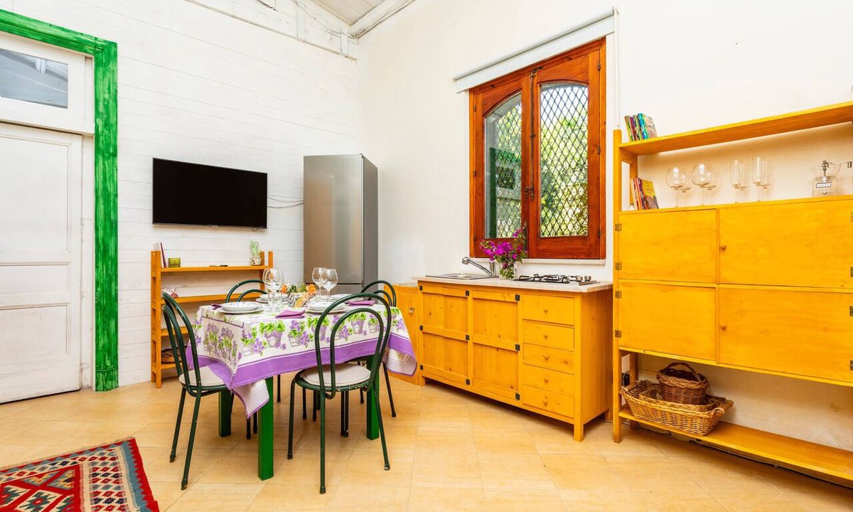 Aci San Filippo Apartment | Apartment 'La Casa Del Fico D’india - Verde' with Shared Garden, Wi-Fi & Air Conditioning