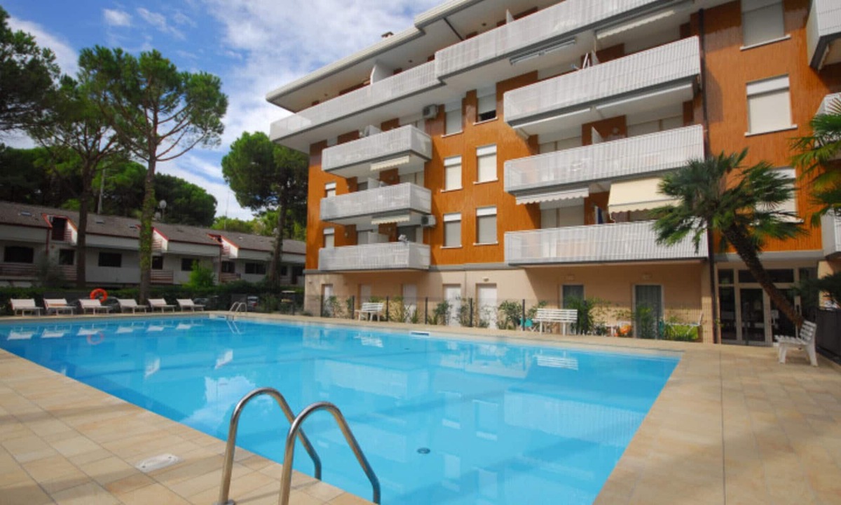 Lignano Riviera Apartment | Comfortable flat by the pool