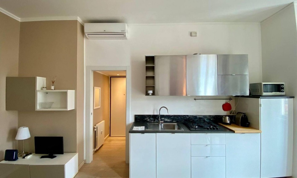 Acquabella Apartment | GuestHost - Piazzale Susa Bright Flat with Veranda