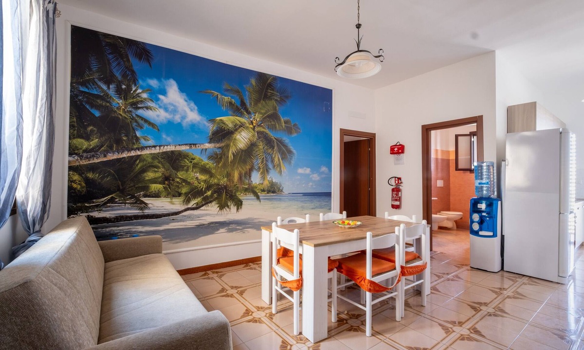 Santa Maria al Bagno House | Holiday Home 'Vacanza Alle 4 Colonne - 1' with Balcony, Wi-Fi and Air Conditioning
