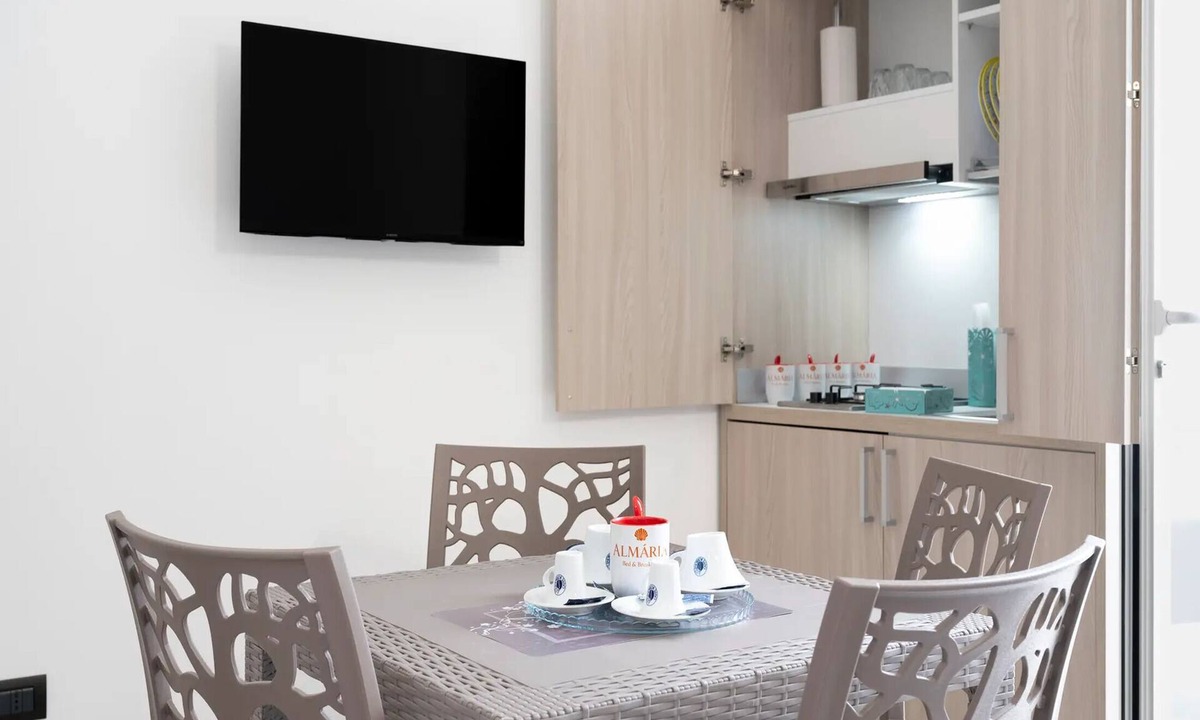 Boncore House | Monolocale Vela – Nuovo con Wi-Fi, Clima e Giardino a Torre Lapillo