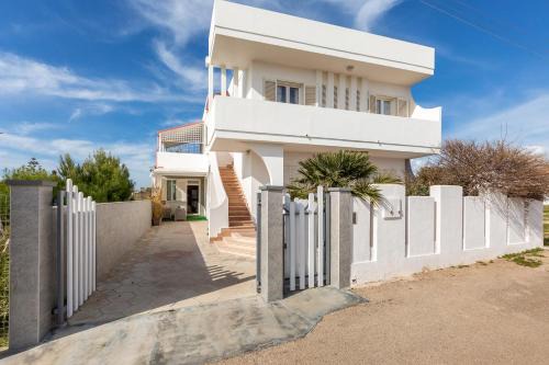 Torre Lapillo House | Villa Iolanda by BarbarHouse