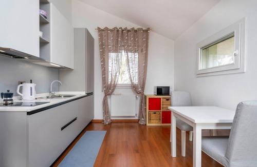 Udine House | A comfortable and bright 40 sq m studio apartment, perfect for two people, located on the first floor of a small villa (no elevator).The property is located in an extremely quiet area surrounded by greenery, with a cycle path nearby. Guests can easily re