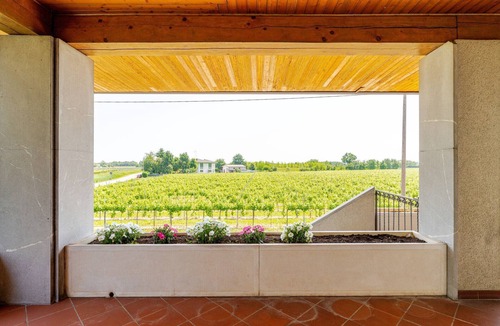 Rivarotta di Pasiano House | A cozy luxury villa surrounded by greenery, featuring spacious, breathtaking terraces