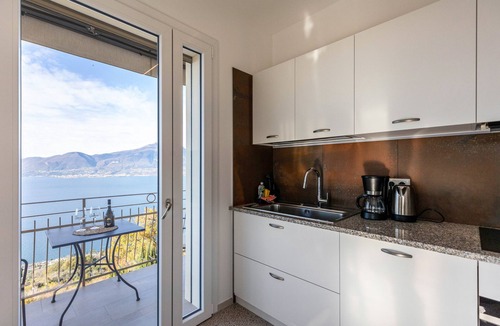 Albisano Apartment | Apartment 'Casa Serena' with Lake View, Wi-Fi and Air Conditioning