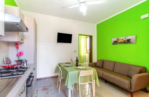 Torre Lapillo Apartment | Apartment 'Due Passi Dal Mare Primo Piano' with Sea View, Shared Terrace and Air Conditioning