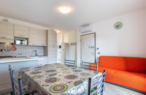 Alghero Apartment | Apartment “Ionio” close to the Beach with A/C, Balcony & Terrace