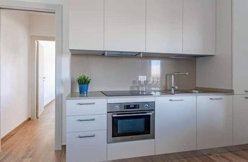 Pisa Apartment | Balcony Tower View - Modern Apartment with Private Parking