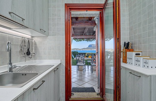Baia Caddinas Apartment | Blue Apartment - S' Abba e Sa Pedra with Sea View, Wi-Fi and Air Conditioning