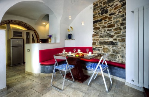 Civezza Condo | Casa Pisani in a building with garden and swimming pool