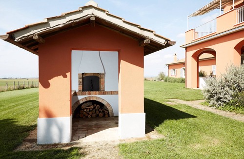 Tarquinia Apartment | Cozy apartment on two levels with private porch.