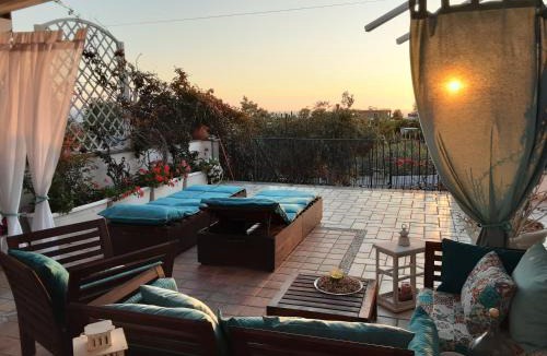 Baia Apartment | DOMUS PARVA - Villa con bio-piscina, spa privata e appartamenti panoramici