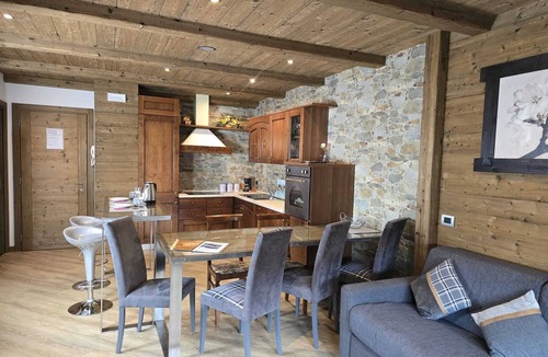 Valtellina Ski Chalet | Exclusive rustic chic chalet with large furnished rooftop garden