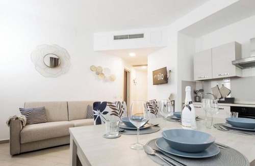 San Teodoro Apartment | Ferry port 1 min| Central 1BR| A/C| WiFi| By Tilo