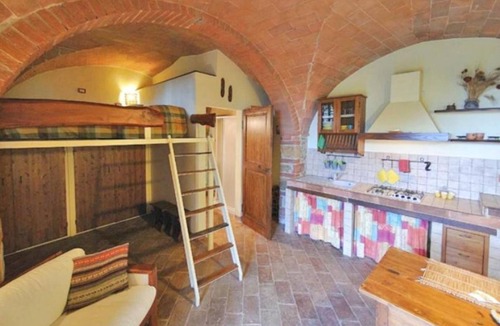 Castel San Gimignano Apartment | Giovanna apartment on two levels overlooking the swimming pool
