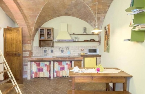 Castel San Gimignano Apartment | Giovanna apartment on two levels overlooking the swimming pool