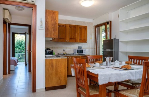 Lignano Riviera Apartment | GuestHost - Bright 55 sqm apartment, perfect for 4 people, located on the first floor of a building with a lift (stairs to access it). The accommodation is located in a quiet residential area surrounded by greenery and is equipped with every comfort incl