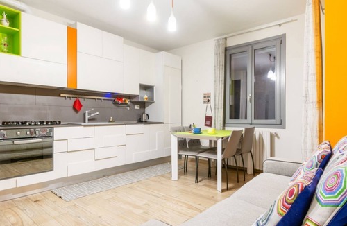 Le Cure Apartment | GuestHost - Comfortable 50sqm apartment with tiled patio that can accommodate up to 4 people. Located on the ground floor of a modern building of recent construction, the apartment is equipped with private parking space for a motorbike (inside the patio)