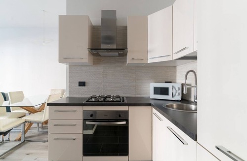Giambellino Apartment | GuestHost - Elegant 70 square meters apartment, perfect for four people, located on the second floor of a building with an elevator (NOT accessible to guests with disabilities).The property is conveniently located just a few meters from the metro station