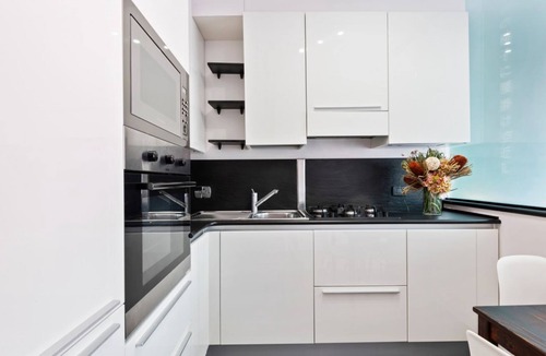 Genoa Apartment | GuestHost - Nice and bright studio apartment in the heart of the Old Port of Genoa, with large panoramic windows overlooking the dock. The apartment is only 300m from the Darsena underground and 800m from the Principe Square railway station. The Genoa Aq