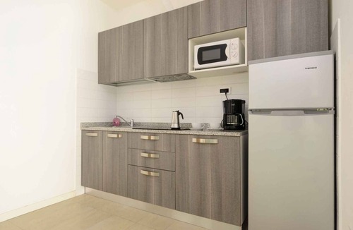 Lignano Sabbiadoro Apartment | Holiday apartment with balcony, air conditioning, and internet