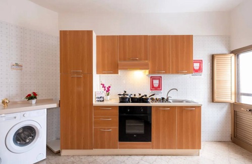 Torre Lapillo House | Holiday Home 'Via Campania 3' with Private Terrace, Garden and Air Conditioning