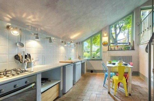 Garlenda House | Hostdomus - Olive & Garden 3