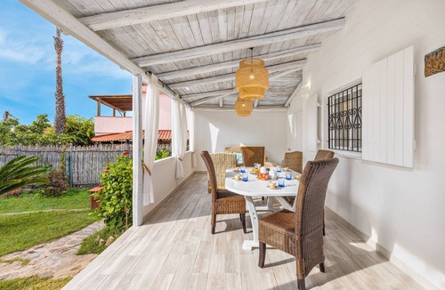 Baia Caddinas House | Mediterranean Holiday Home with Wi-Fi, A/C, Garden & Terrace