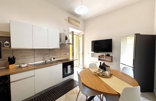Province of Cagliari Apartment | Modern home with garden & BBQ, between Cagliari city center and the sea