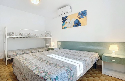Chiesiola Resort | Property in a holiday village 'Baia Falcone-Bilocale 407' with sea view and air conditioning