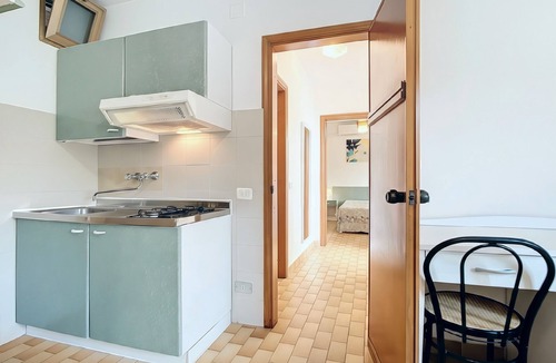 Chiesiola Resort | Property in a holiday village 'Baia Falcone-Bilocale 407' with sea view and air conditioning