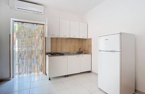 Chiesiola Resort | Property in the holiday village 'Baia Falcone - Standard 204' with sea view and air conditioning