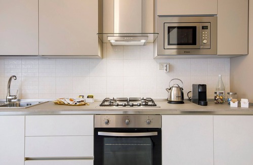 Caronno Pertusella Apartment | Studio Apartment 'La Casa Di Angela' with Private Garden, Wi-Fi and Air Conditioning
