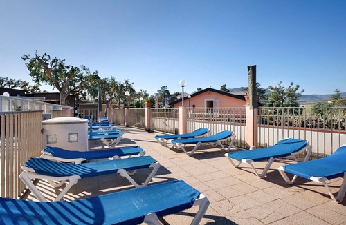 Lavina Apartment | Studio Apartment "Monolocale La Pineta 46" with Shared Pool, Private Terrace & Wi-Fi