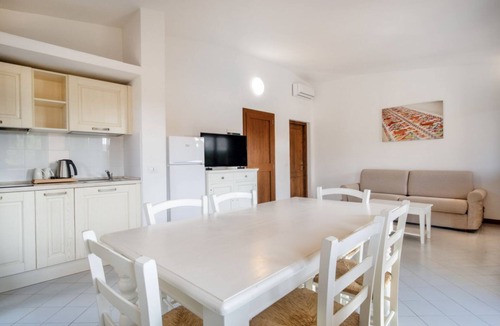 Costa Serena Apartment | Three-Room Suite: 70 sq m (maximum 6 guests + 1 infant in a cot - 0-2 years old), consisting of a living room with a double sofa bed, a double bedroom and a bedroom with twin beds, a bathroom with shower, and a kitchenette.Some three-room apartments have