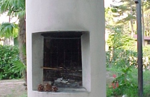 Lignano Riviera Apartment | Tranquil green retreat with garden, patio and BBQ