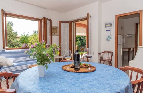Suaredda-Traversa Villa | "Villetta Corbezzolo" surrounded by the greenery of a Park.