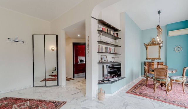 GuestHost - Spacious and welcoming 80 square meters apartment, perfect for four people, located on the fifth floor of a building with an elevator (NOT accessible to disabled guests).The property is located in the Sturla area, a residential neighborhood i