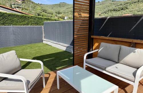 Costa dʼOneglia Apartment | HOST4U - Dimora degli Ulivi, New Apartment with one Bedroom, Terrace and Parking, 10 minutes to the beach