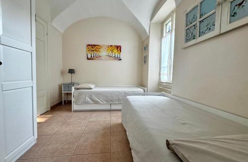 Vallecrosia Apartment | Villa Angelina Holiday Homes I Casa Glicine I 5 minuti a piedi dalle spiagge I Giardino I Parcheggio privato